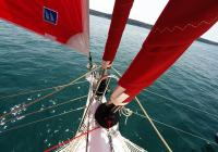 multihull yacht bow roll genoa sail gennaker